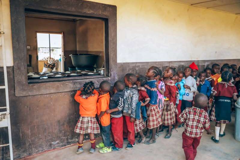 Kids Queuing For Food Makwati Zambia