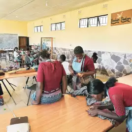 Teachers making crafts in Shalom School